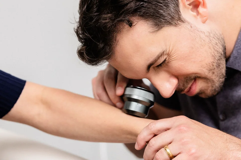 Dermatoscope examination at Wall Dermatology